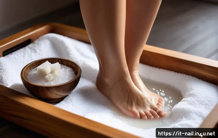 풋케어 루틴  주 1회 관리법 - A cozy evening scene showing a person&rsquo;s feet soaking in a warm foot bath with essential oils and sea...